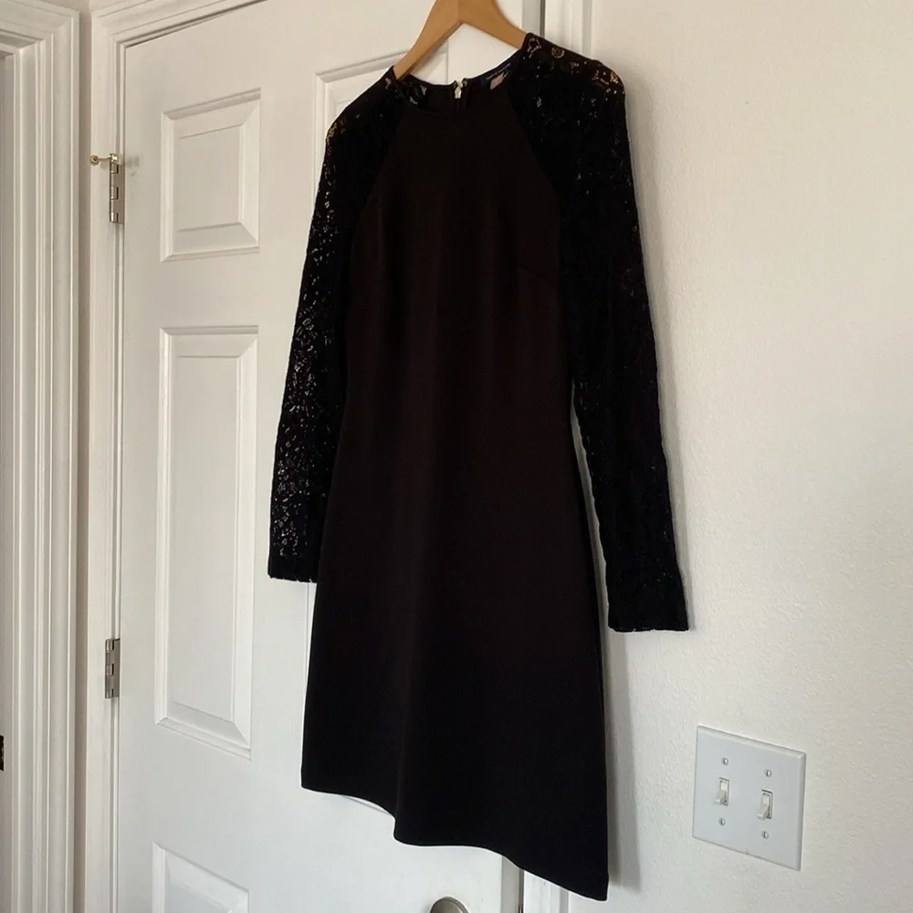 Tommy Hilfiger little black dress with long sleeves lace sleeves.